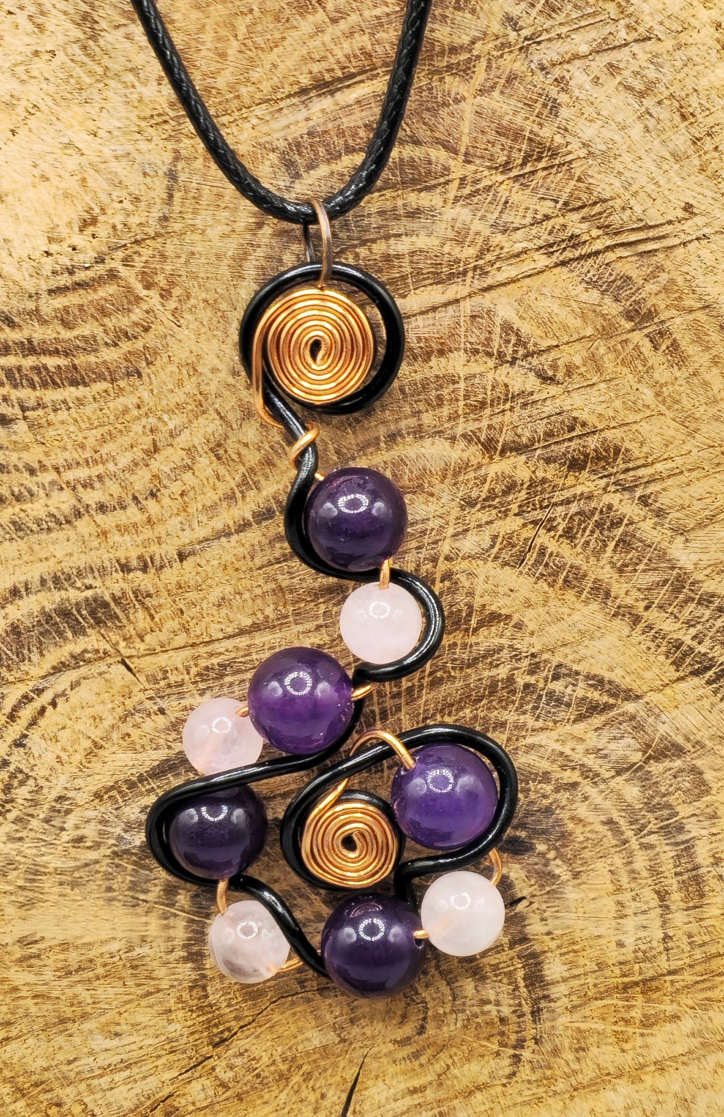 Amethyst and Rose Quartz whorl pendant
