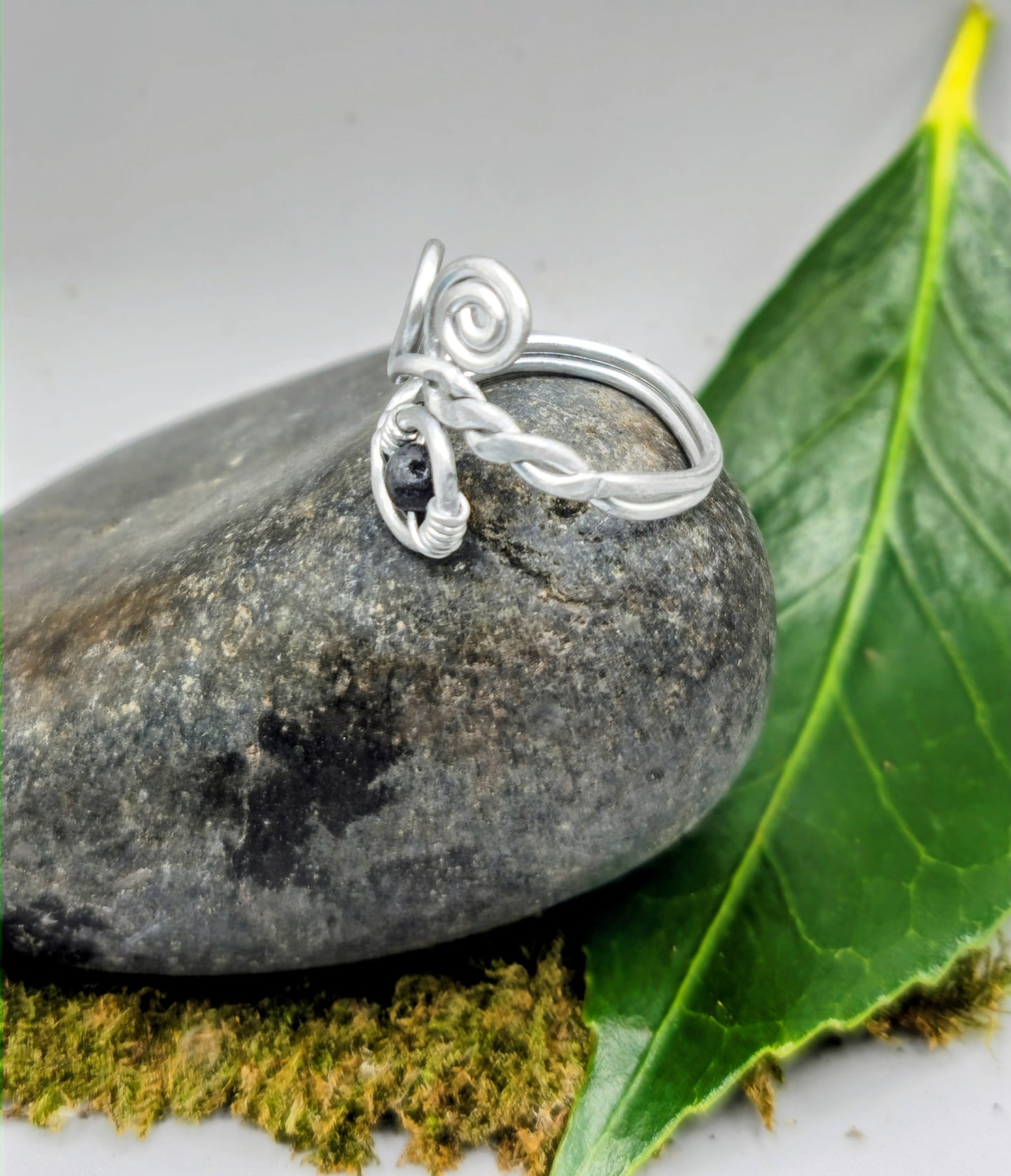 Silver spiral and Lava stone ring