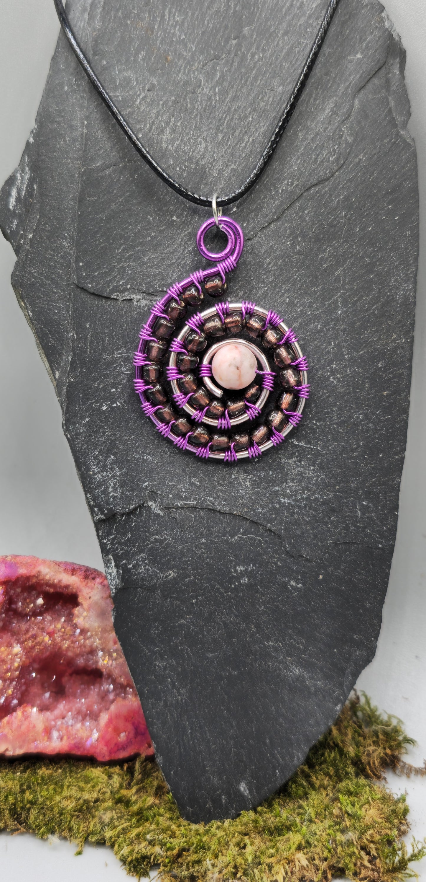 Rhodonite and purple bead spiral pendant