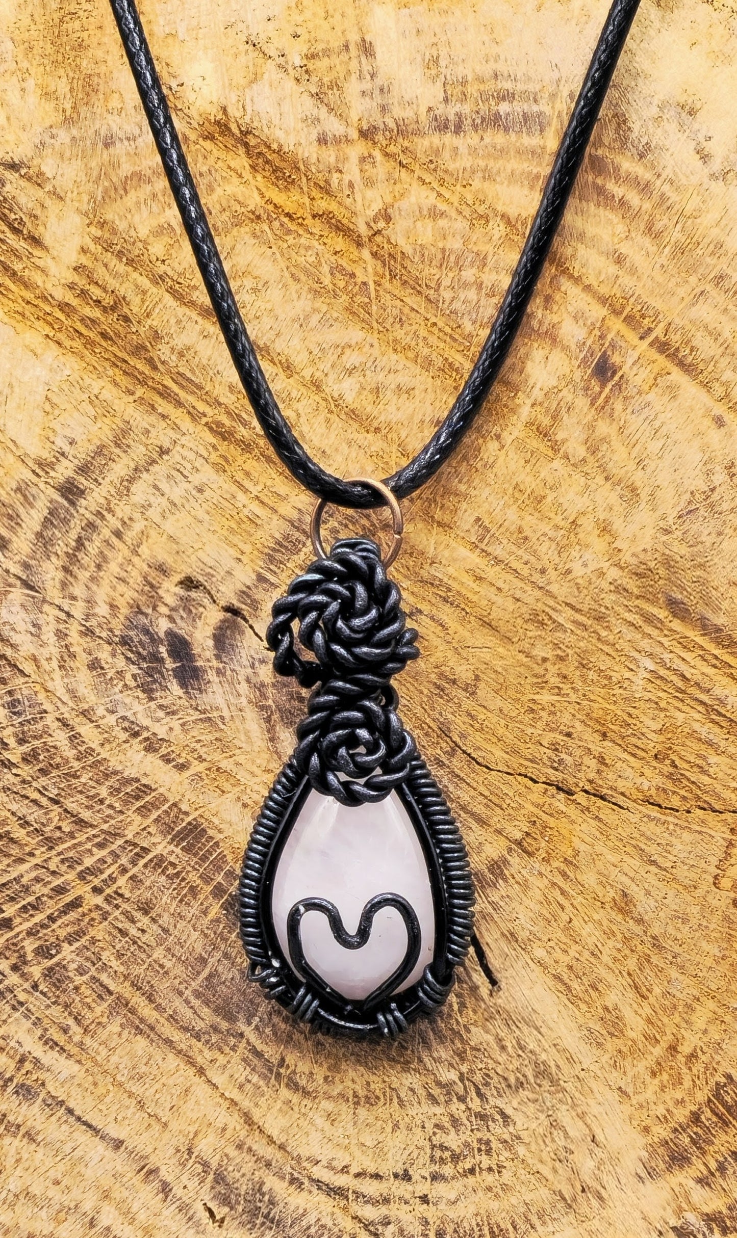 Intricate wire wrapped heart pendant