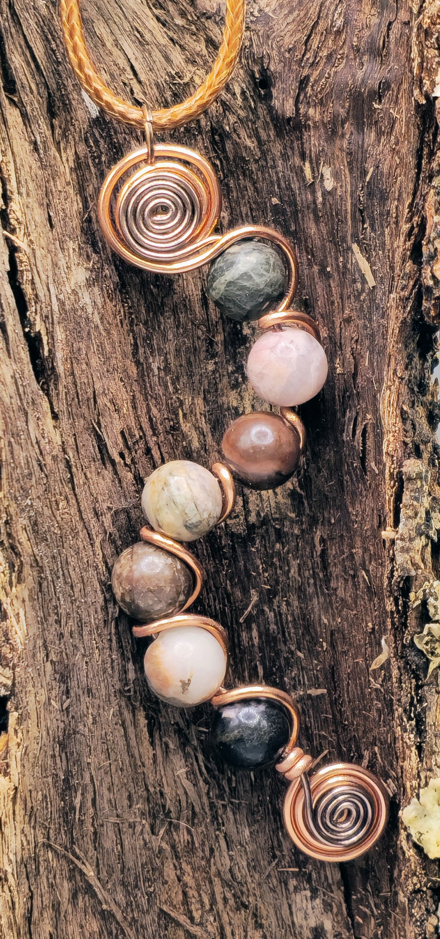 7 bead Rhodonite wavy pendant