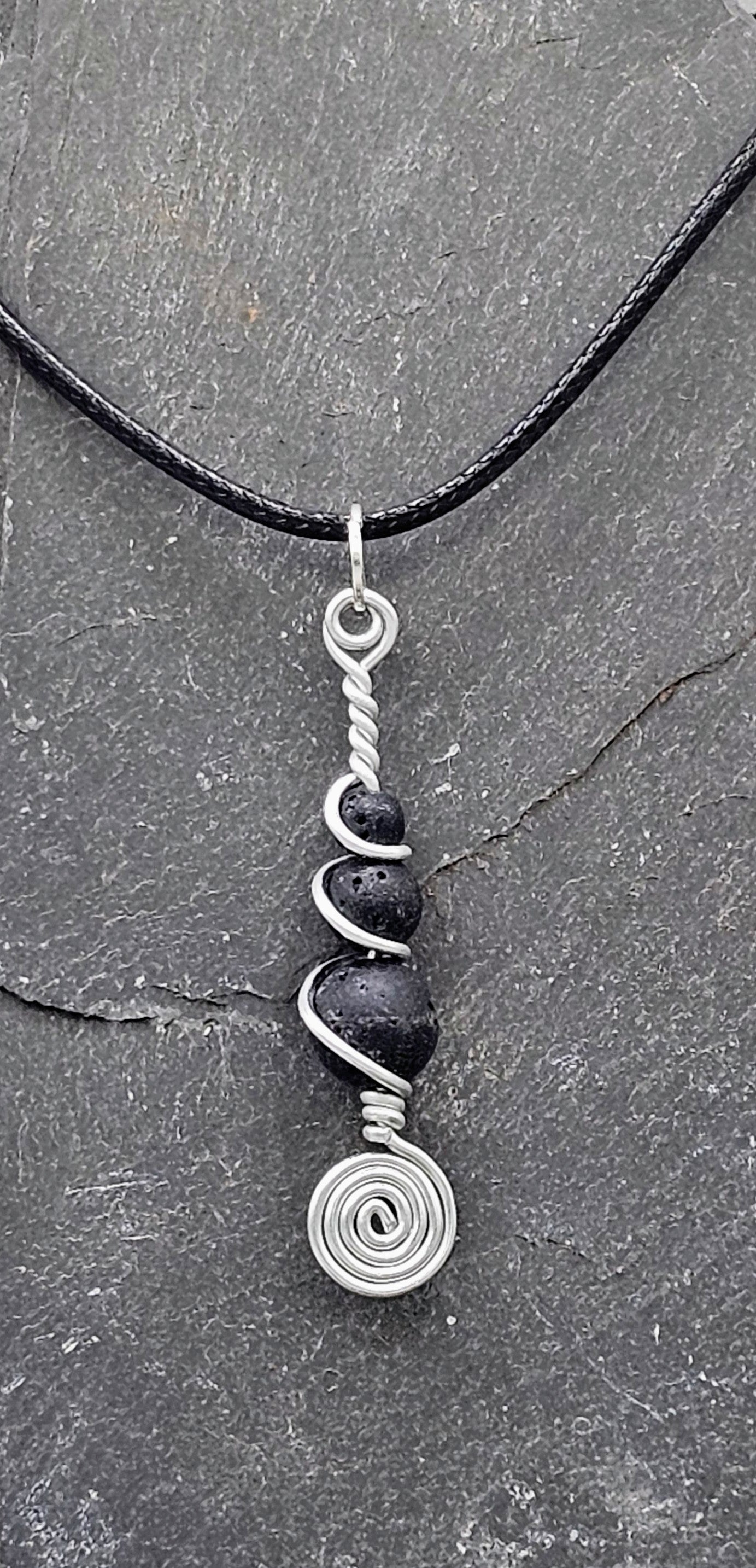 Silver and 3 lava stone pendant