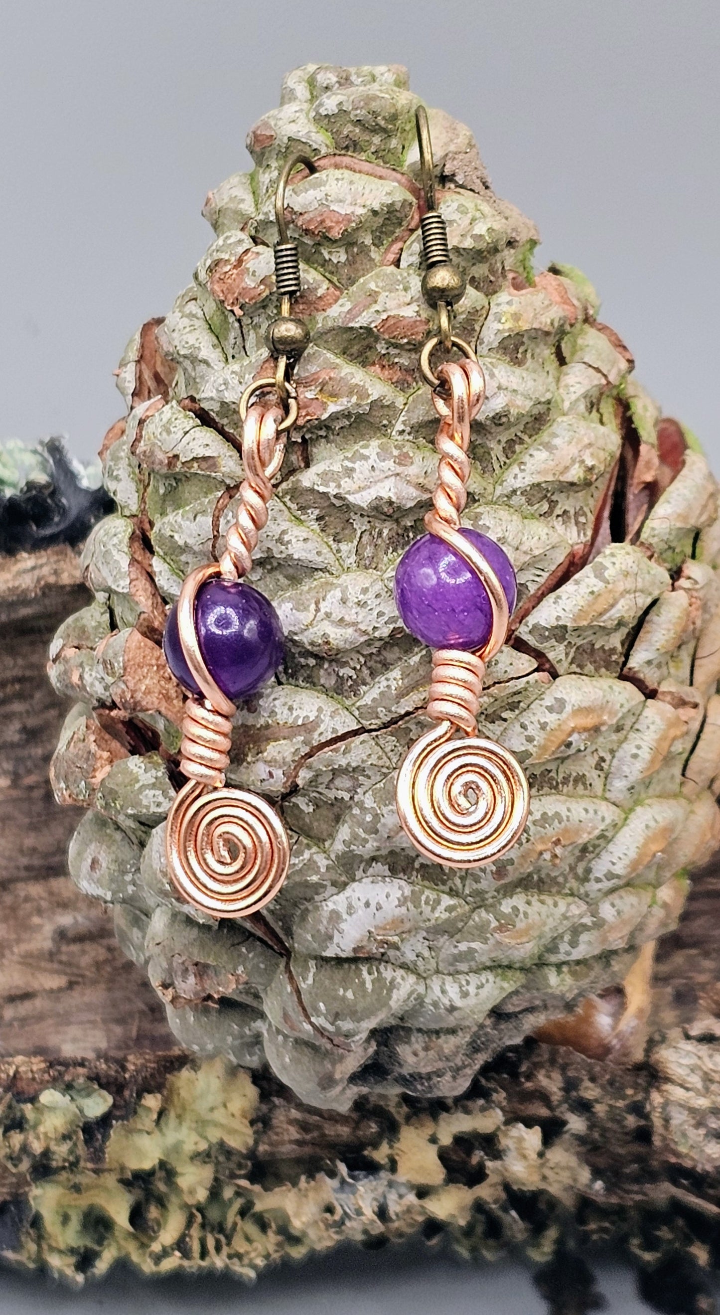 Amethyst and copper spiral earrings