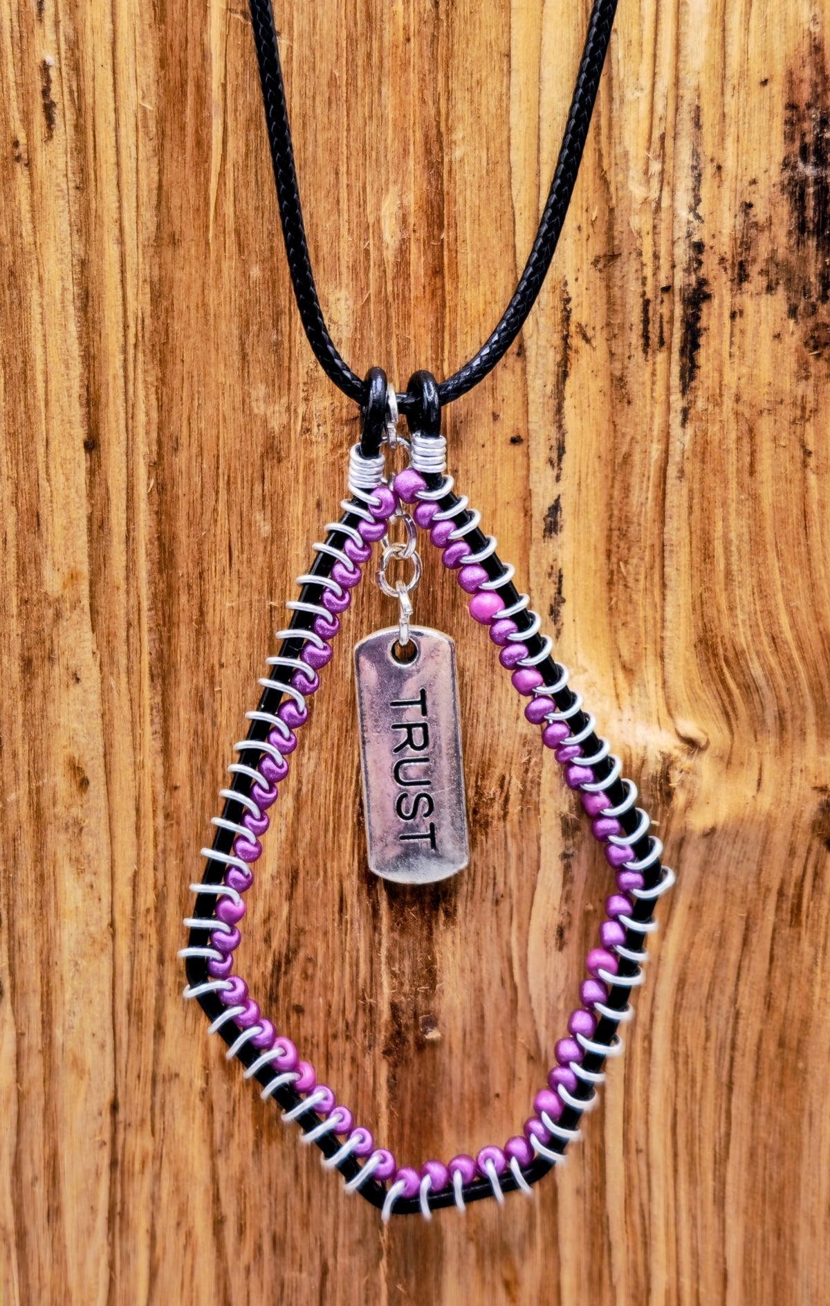 Trust word pendant
