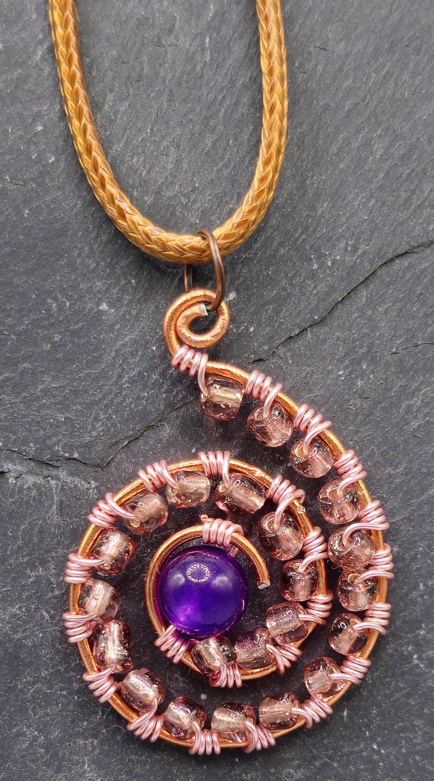 Amethyst and wire wrapped bead spiral pendant