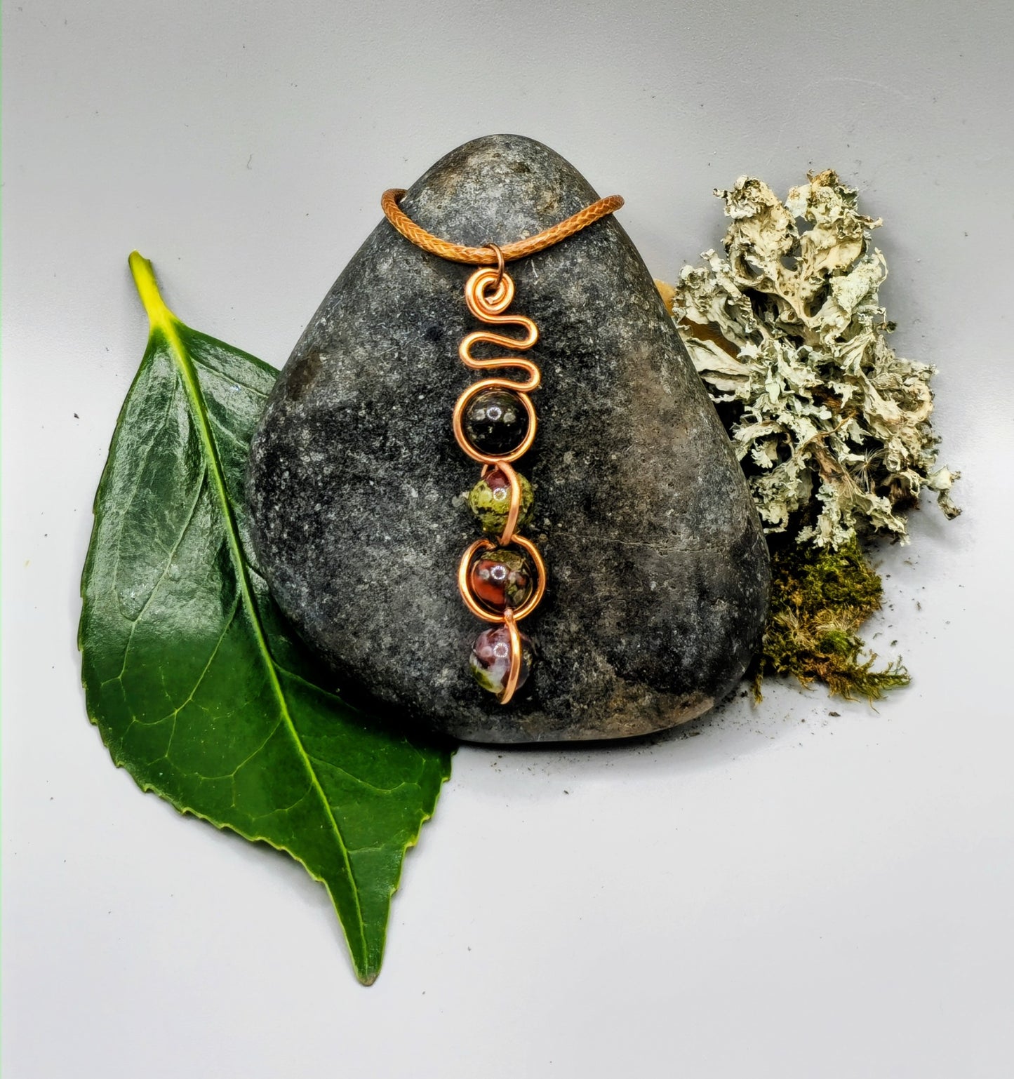 Copper coloured Dragon Blood stone pendant