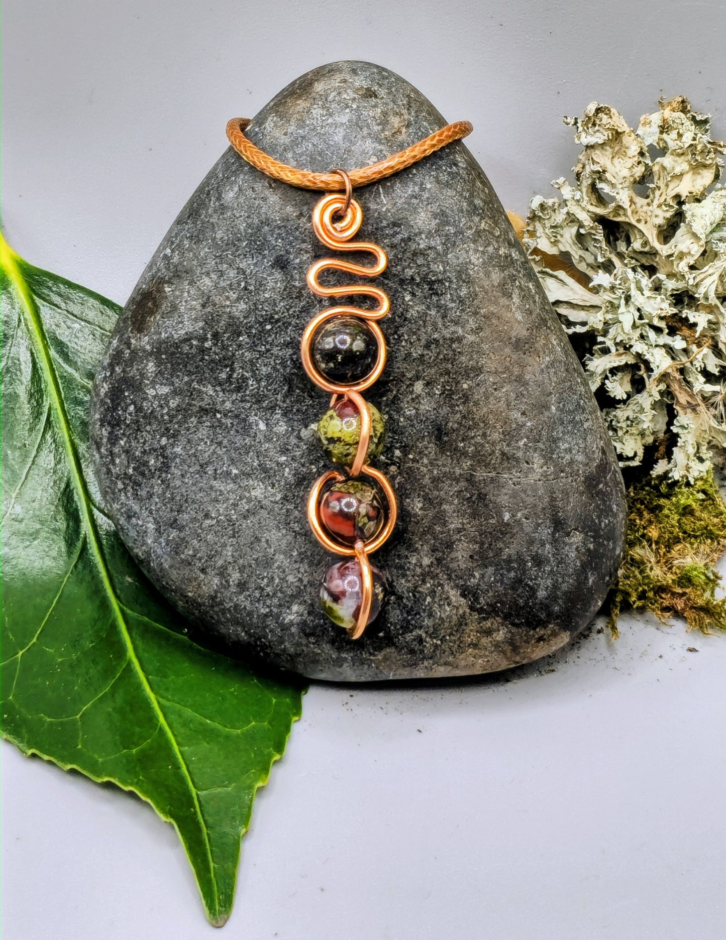 Copper coloured Dragon Blood stone pendant
