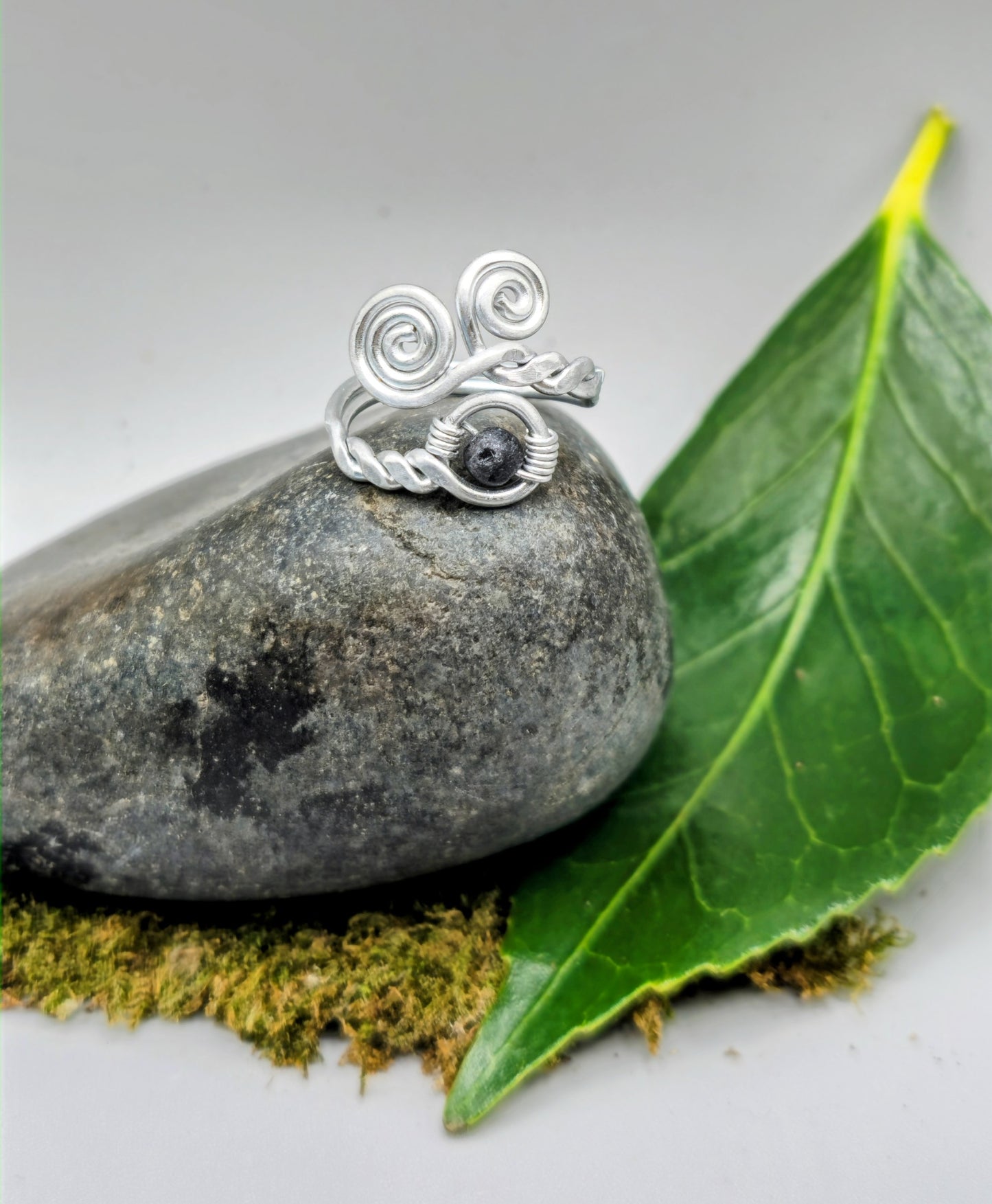 Silver spiral and Lava stone ring
