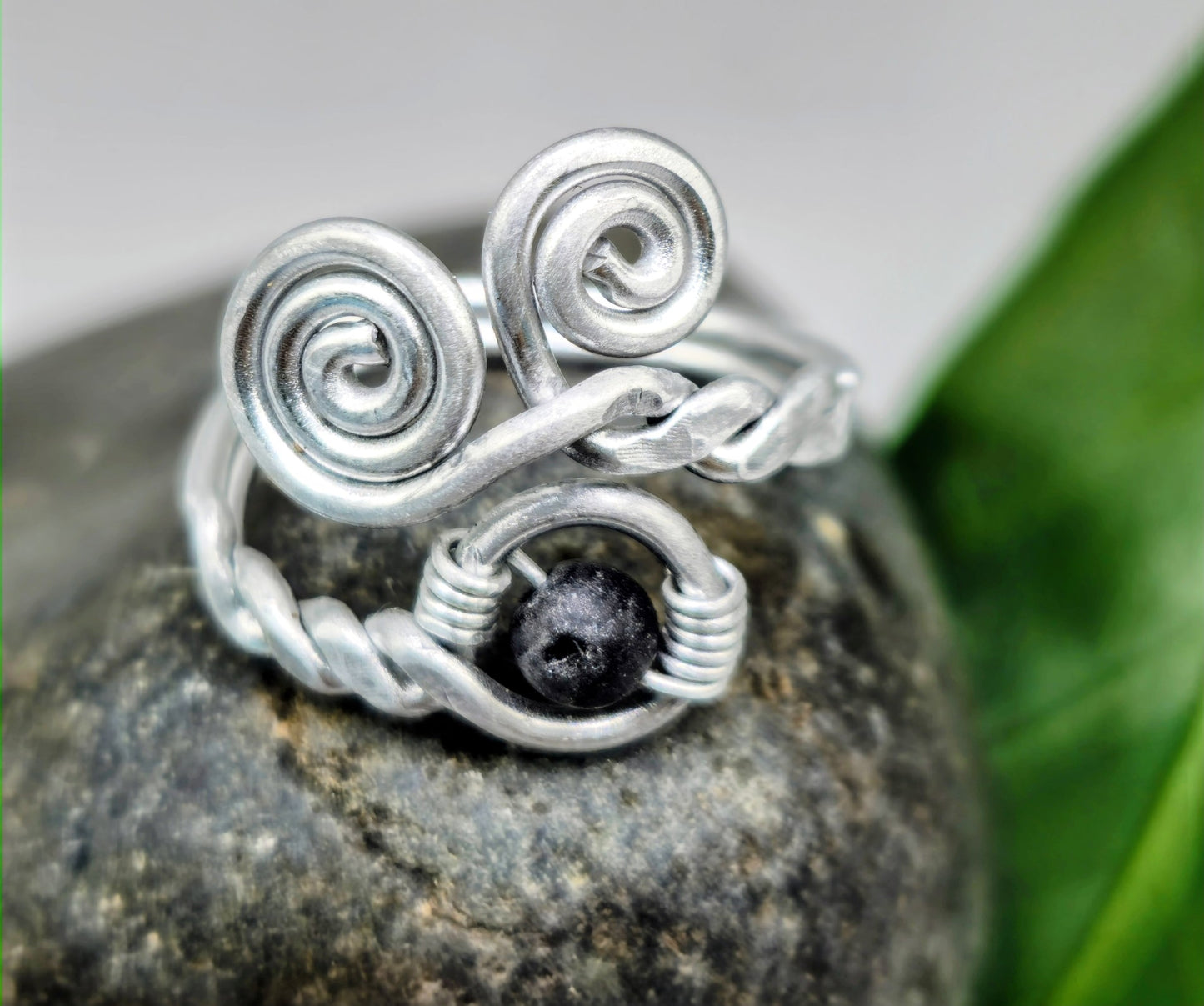 Silver spiral and Lava stone ring