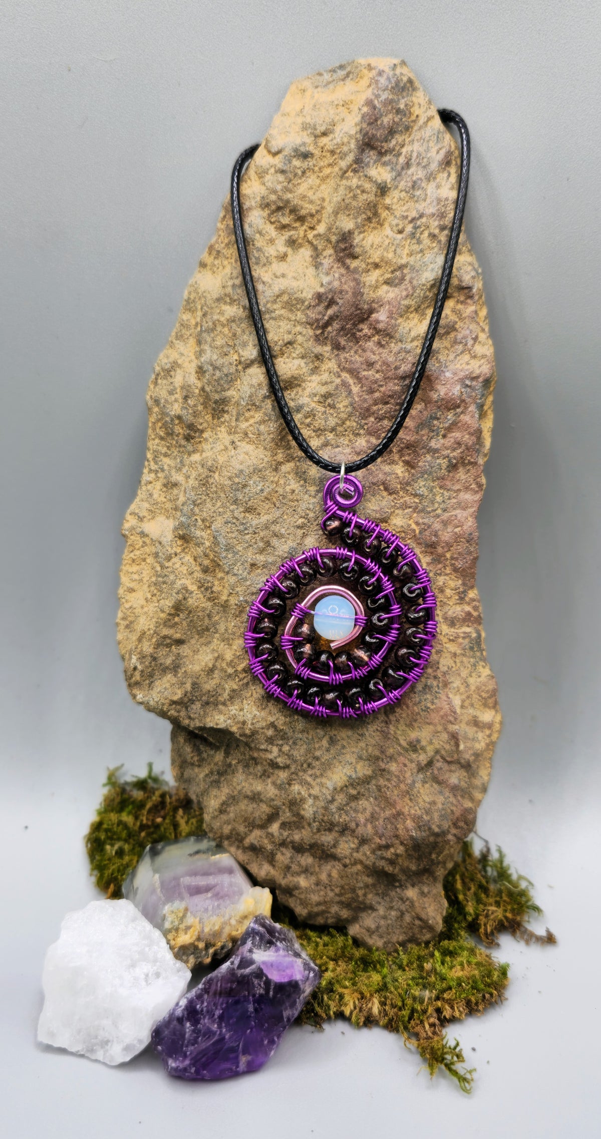 Opalite and purple beaded spiral pendant