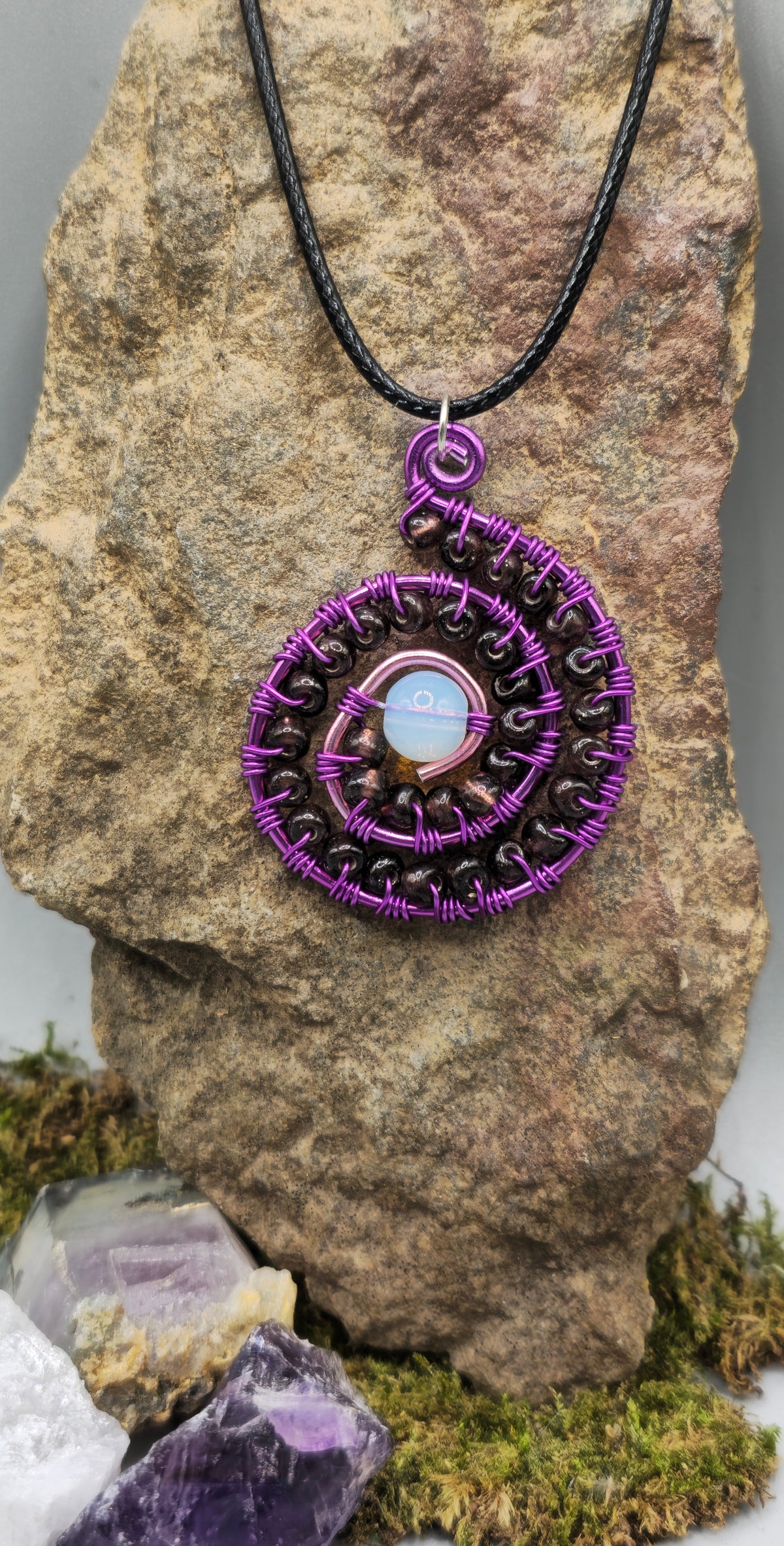 Opalite and purple beaded spiral pendant
