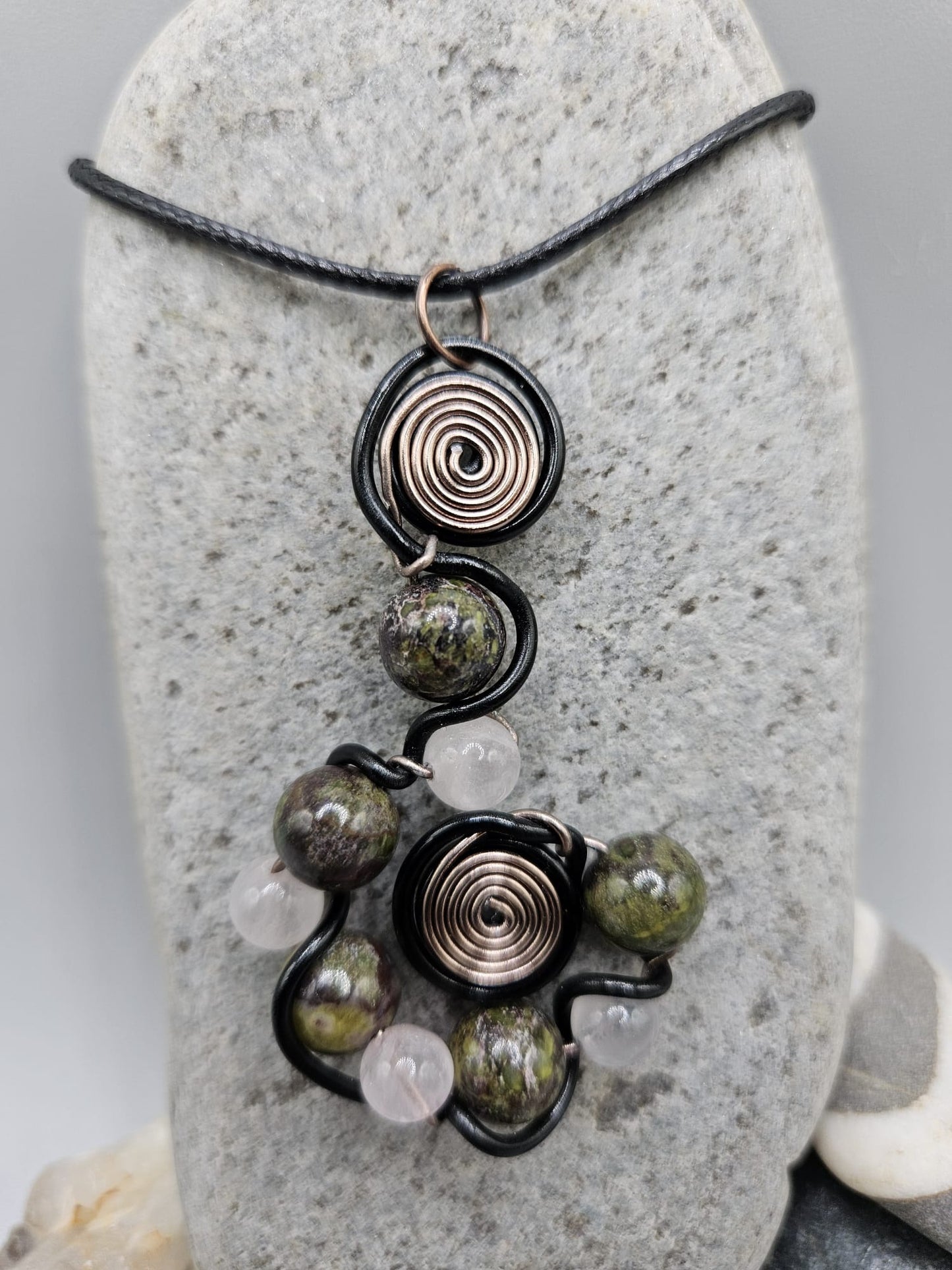 Dragon Blood and Rose Quartz whorl pendant