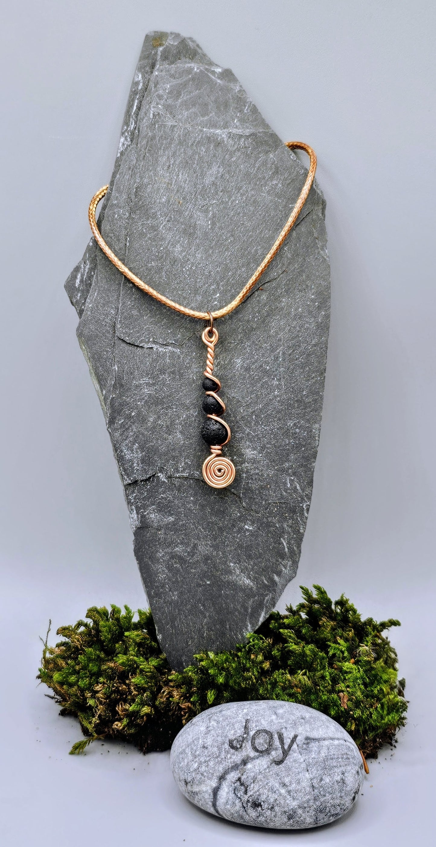 Copper and 3 lava stone pendant