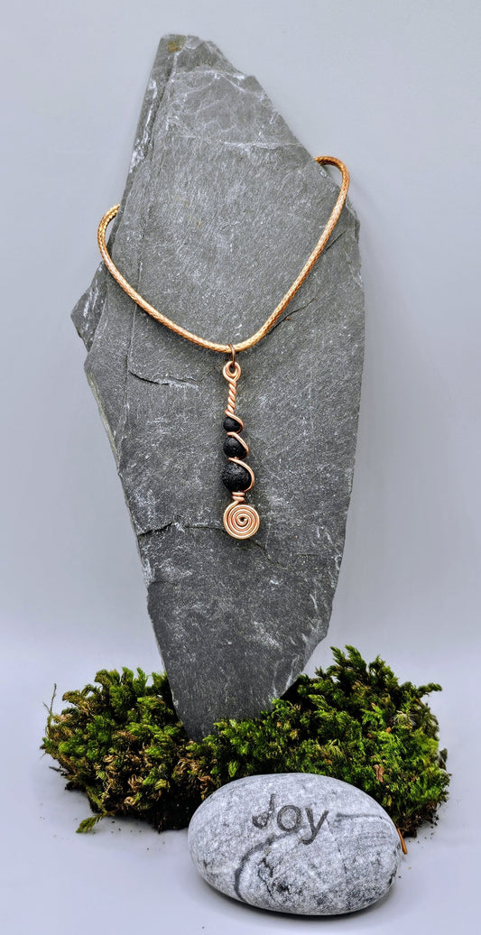 Copper and 3 lava stone pendant