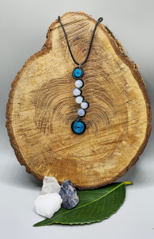 Electric blue, or pink, and black 5 bead twist pendant.