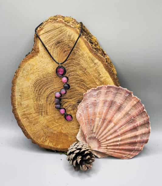 7 bead pink and black pendant