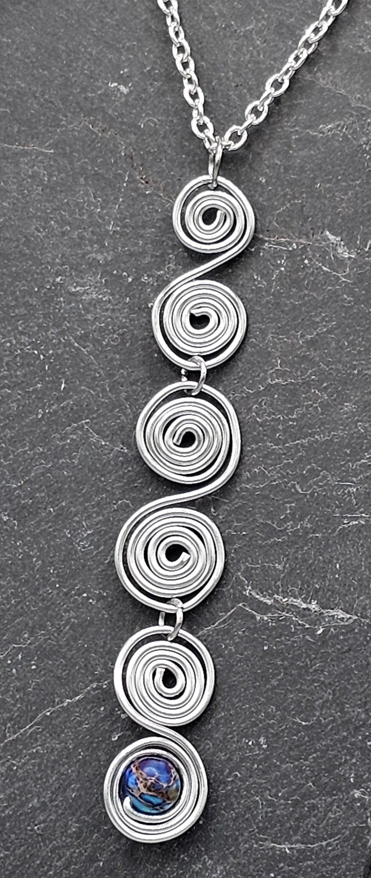 Silver spiral drop with Blue Jasper
