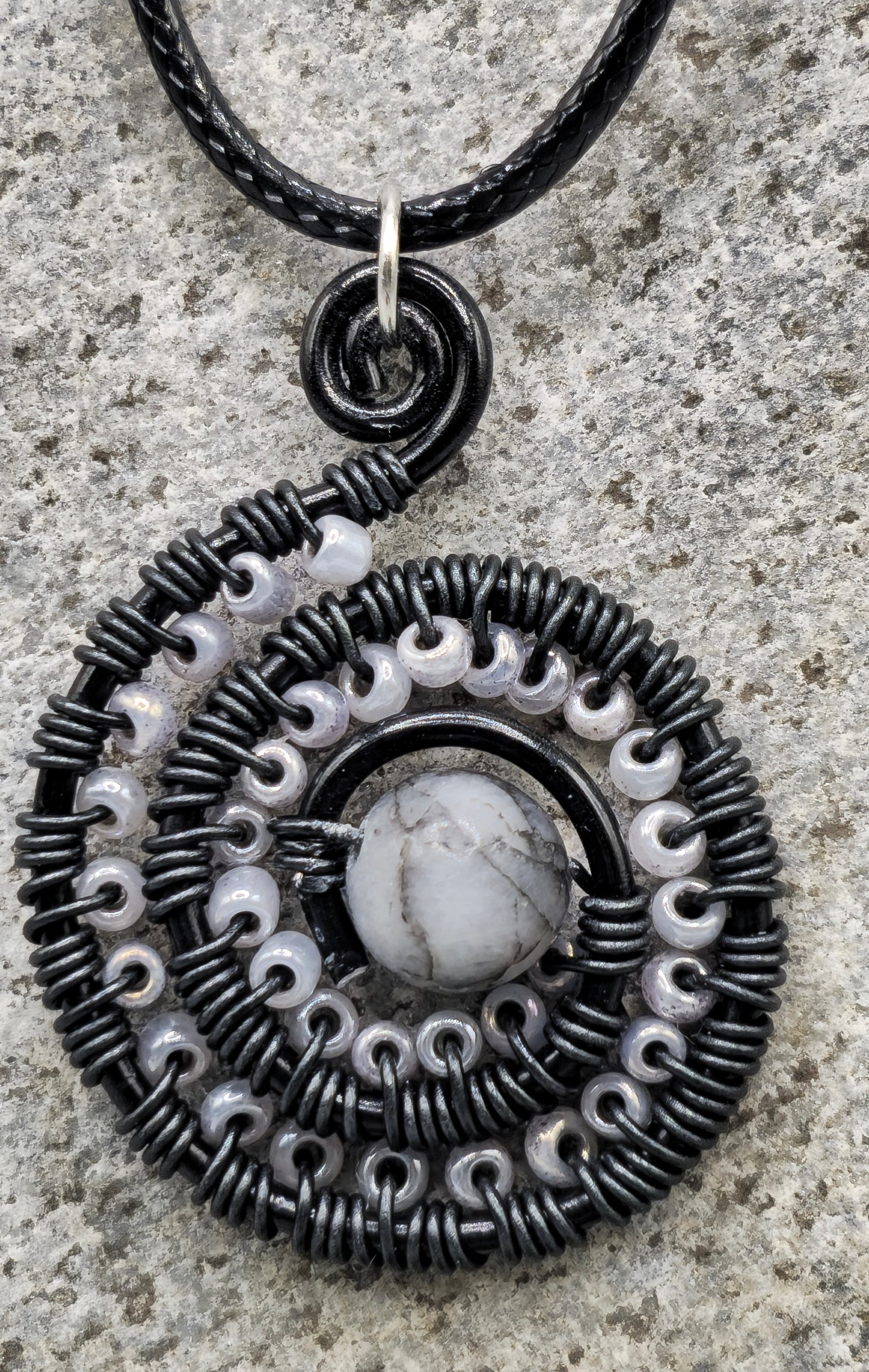 Rhodonite and grey bead spiral pendant