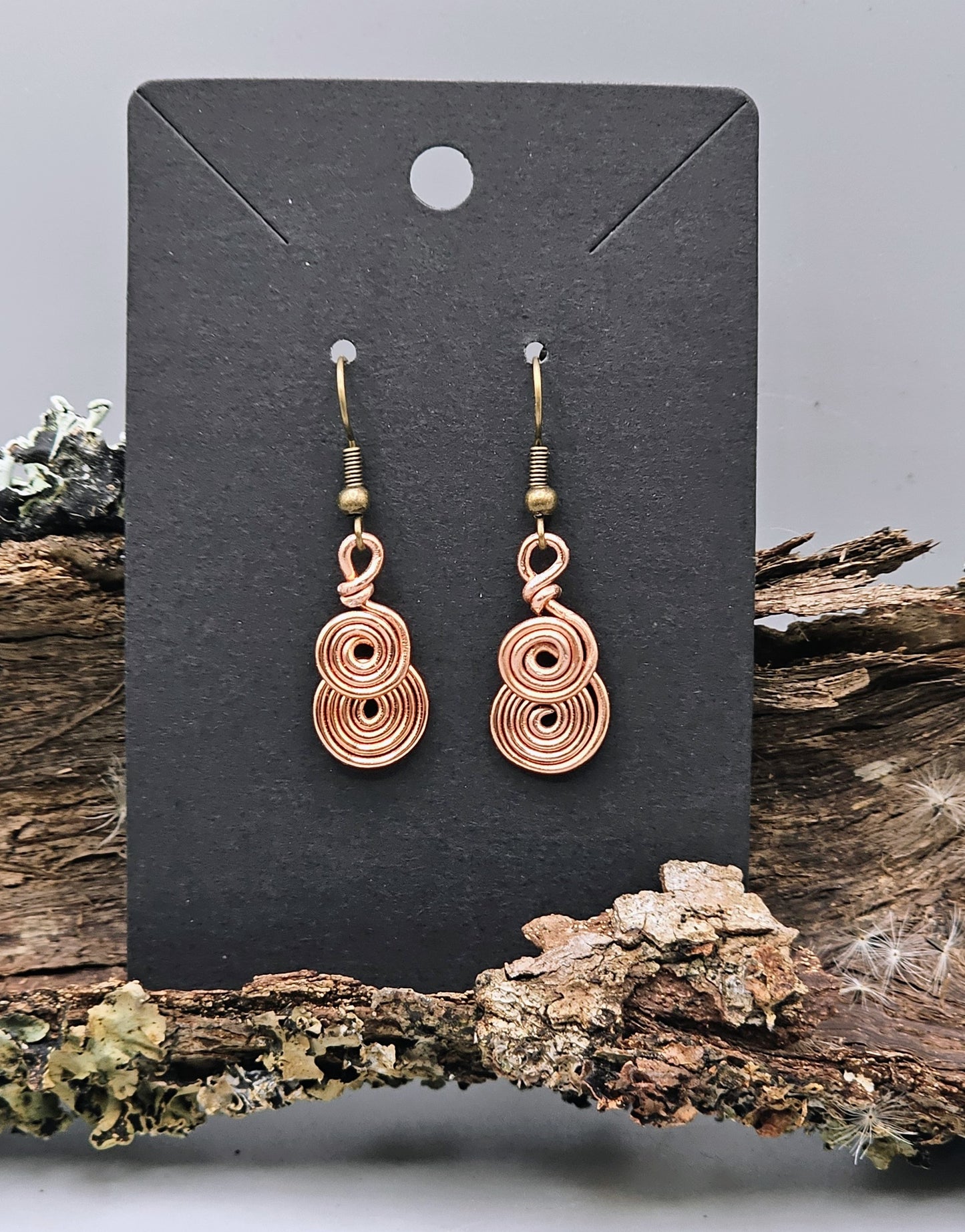 Copper coloured spiral earrings