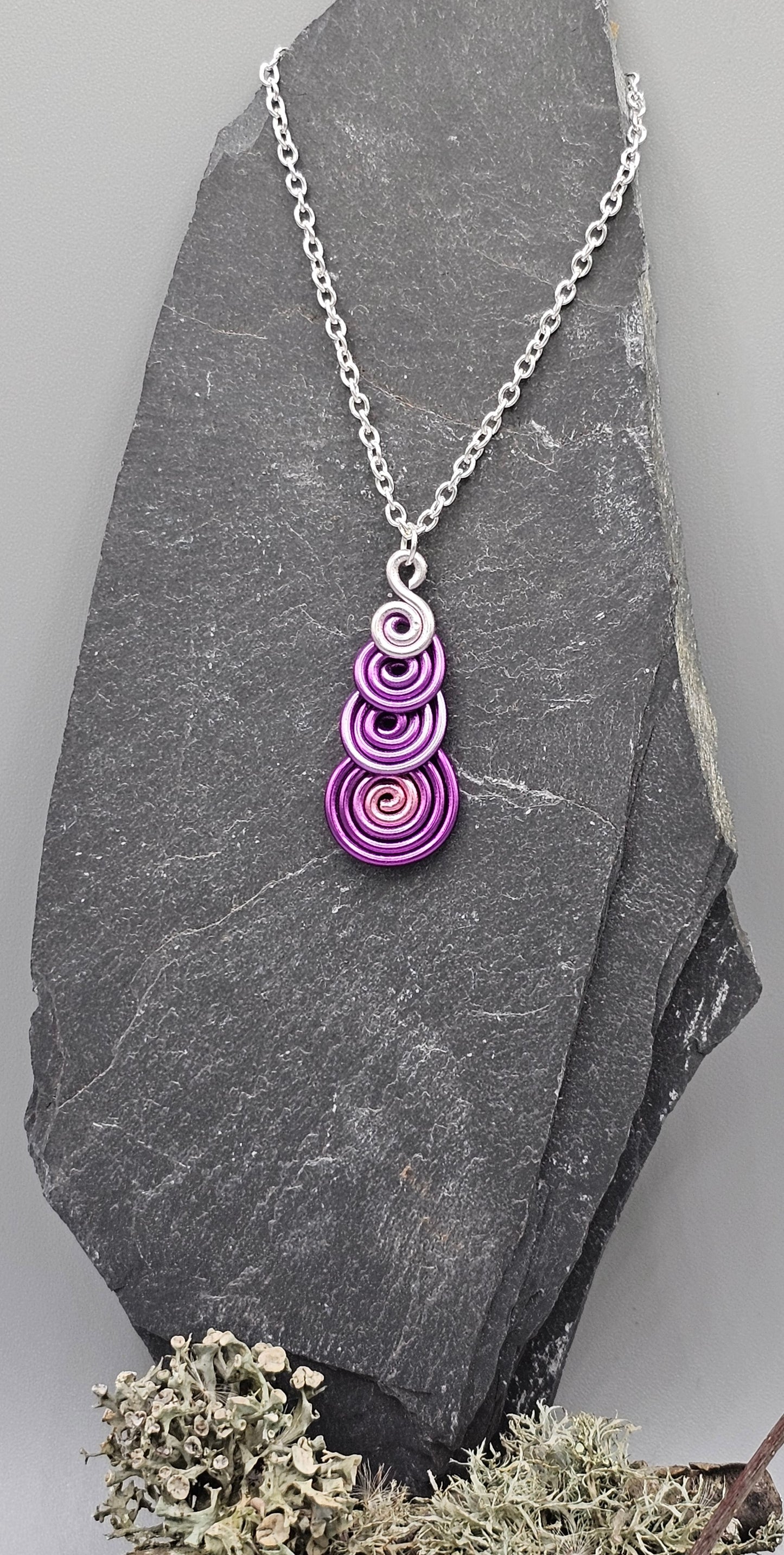 Pink ombre spiral pendant