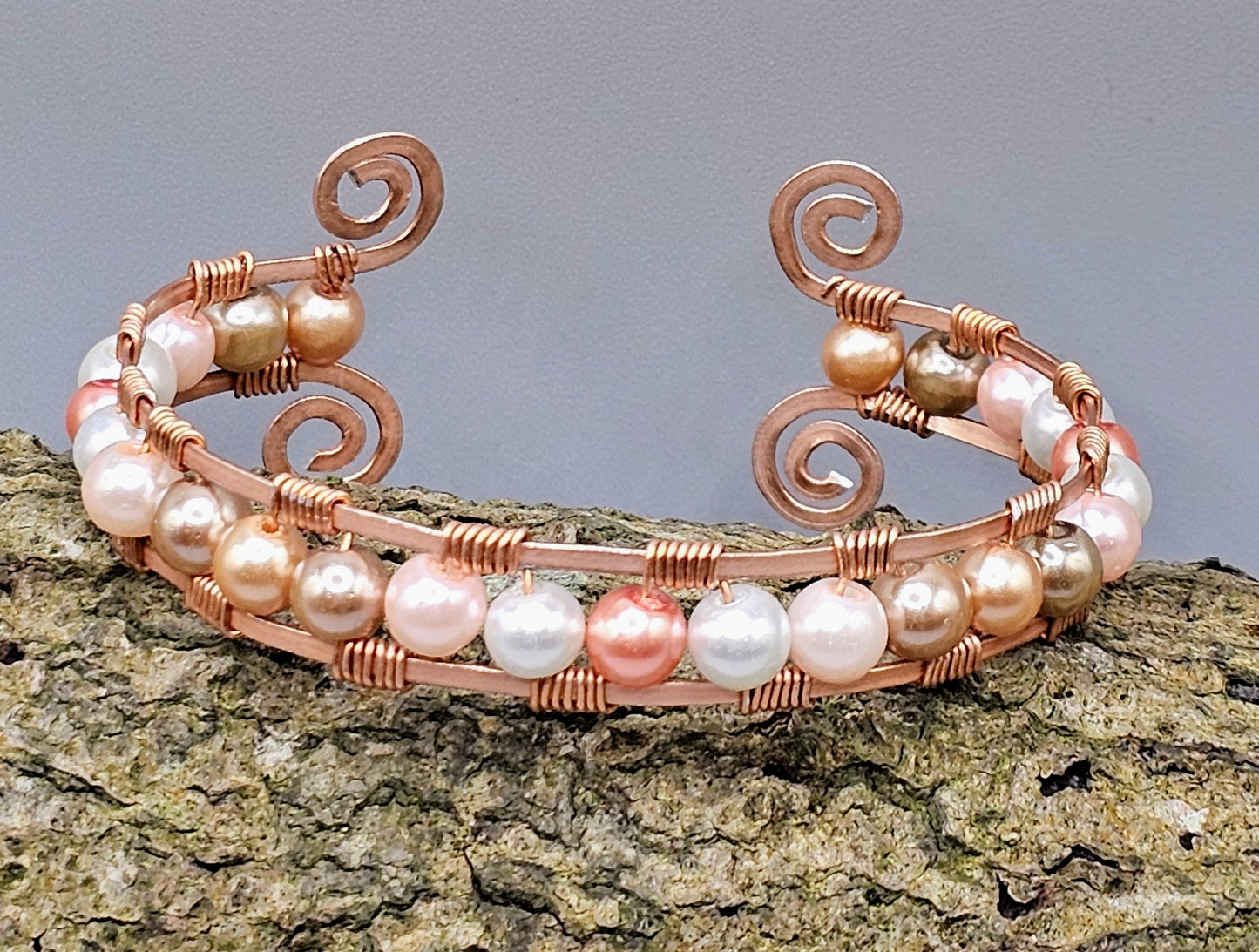 Pink tone pearl bead bracelet