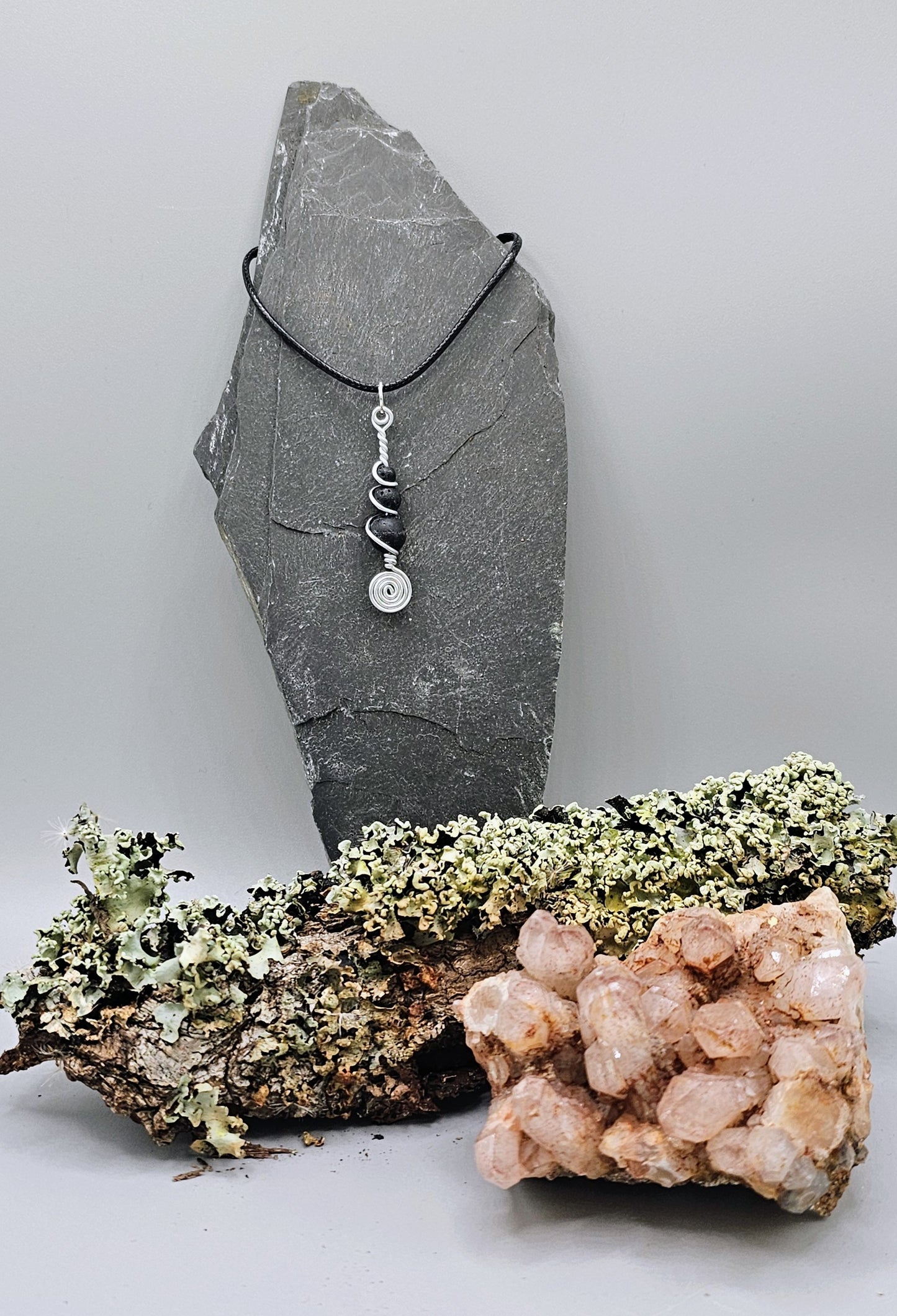 Silver and 3 lava stone pendant