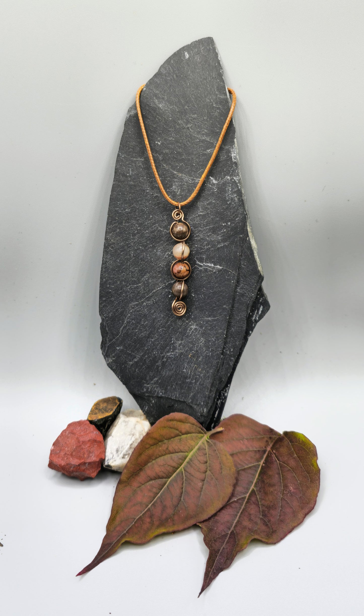 4 Rhodonite bead back and forth pendant