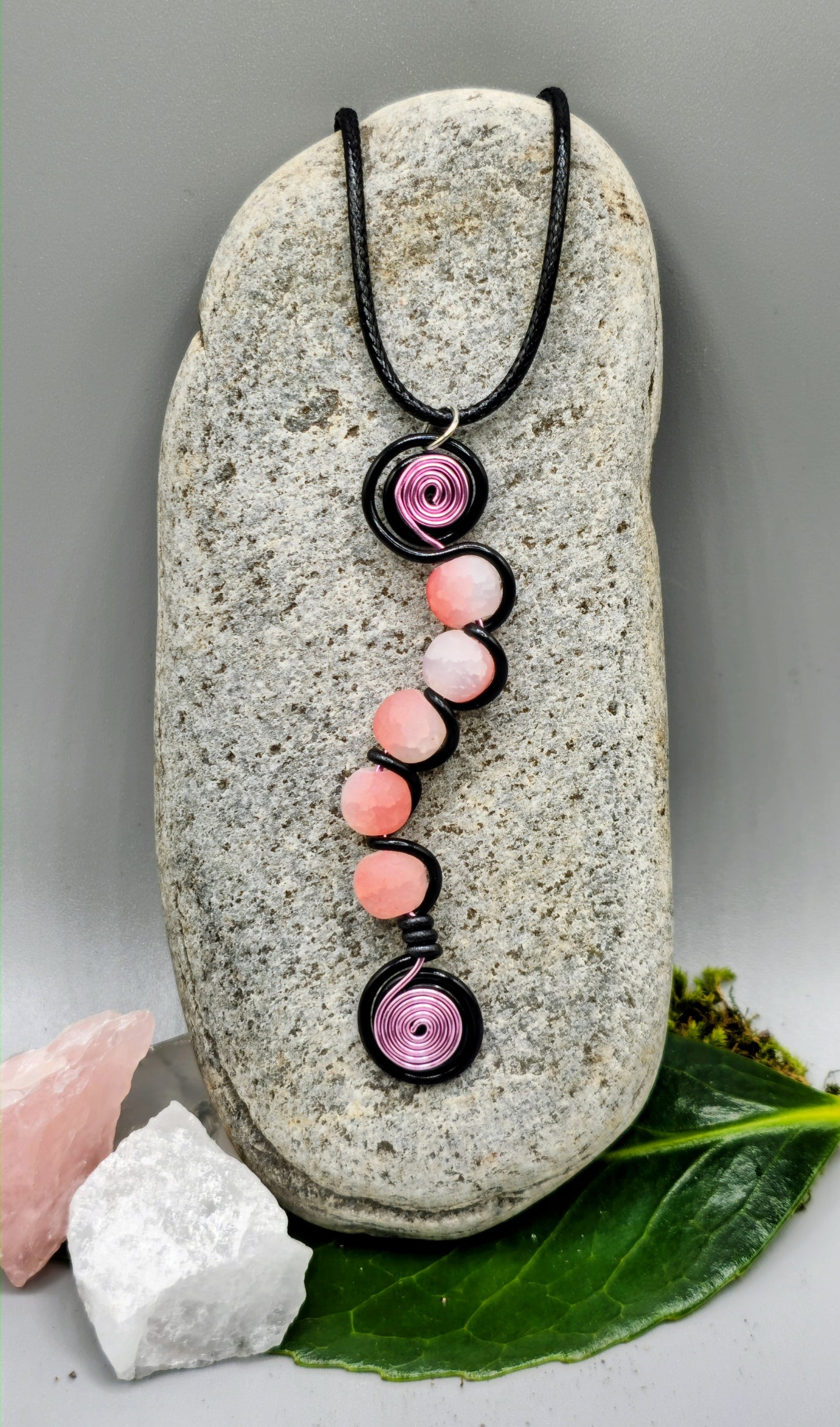 Electric blue, or pink, and black 5 bead twist pendant.