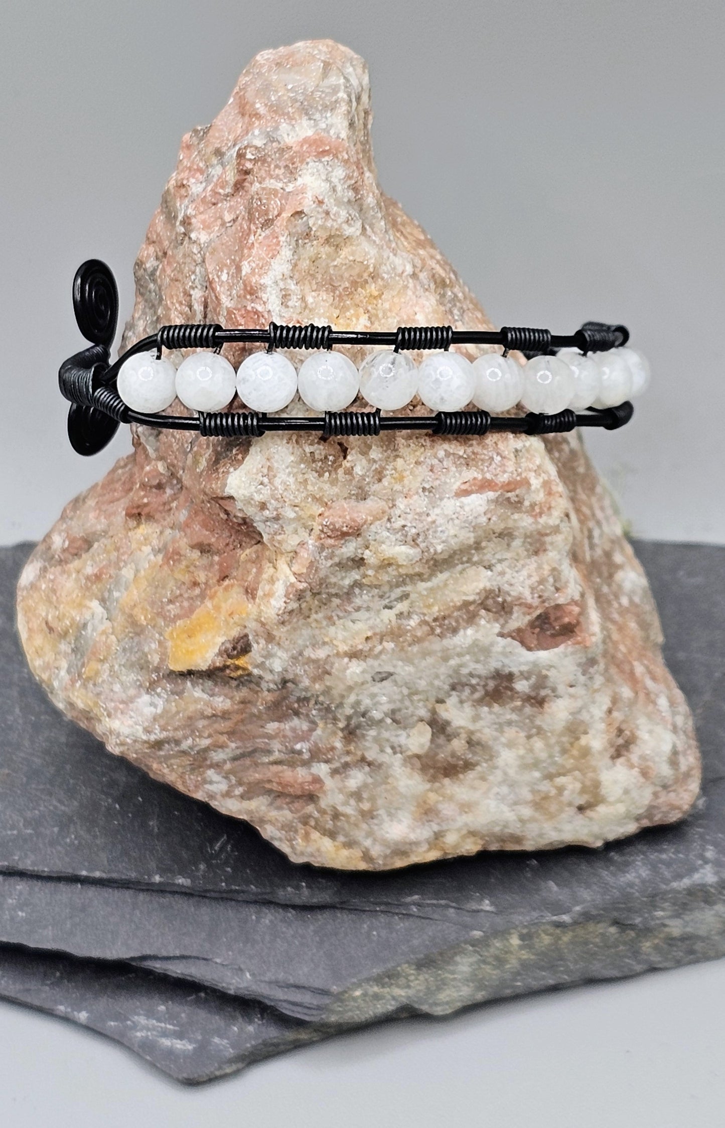 Moonstone and black spiral bracelet