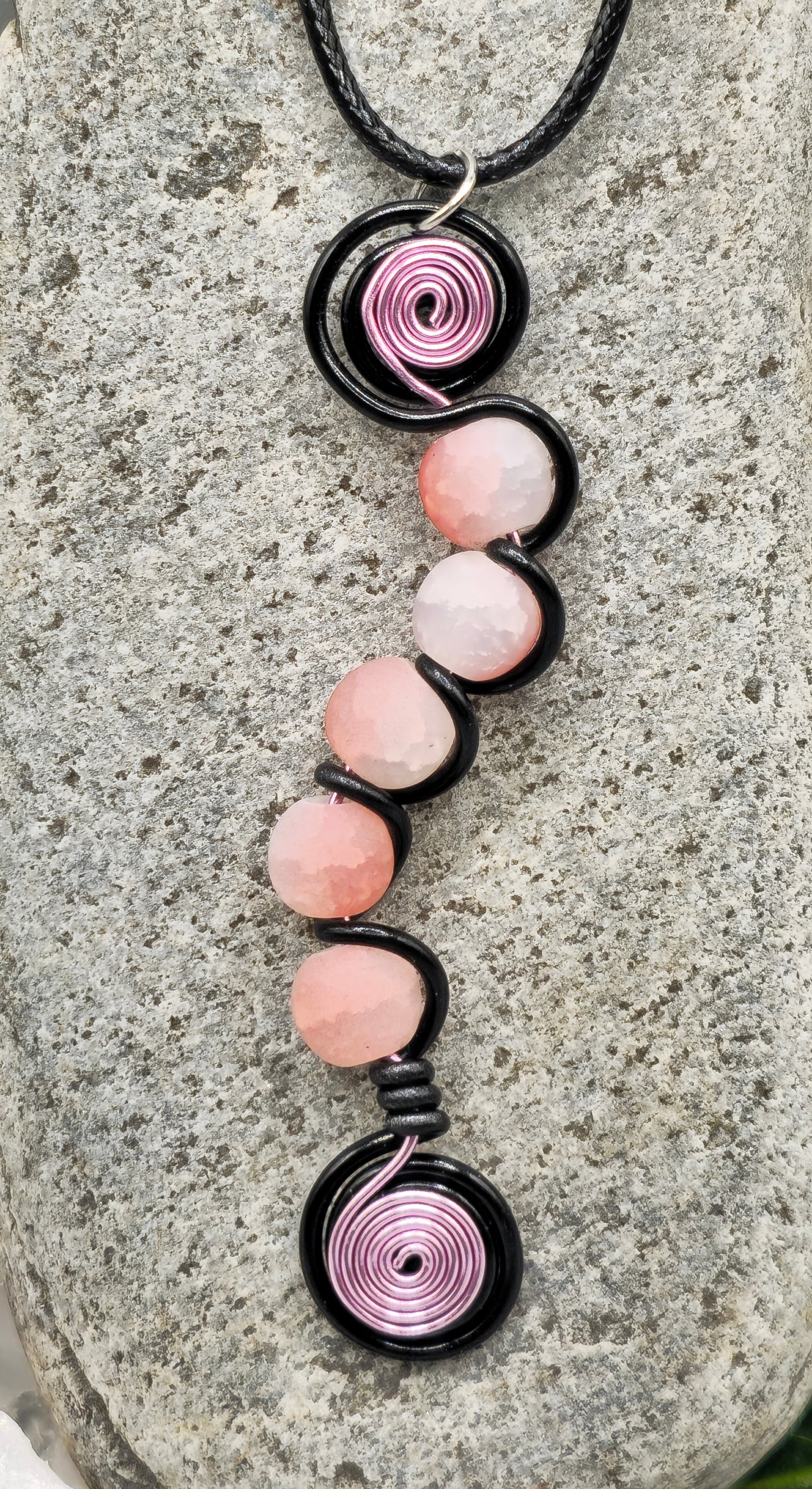 Electric blue, or pink, and black 5 bead twist pendant.