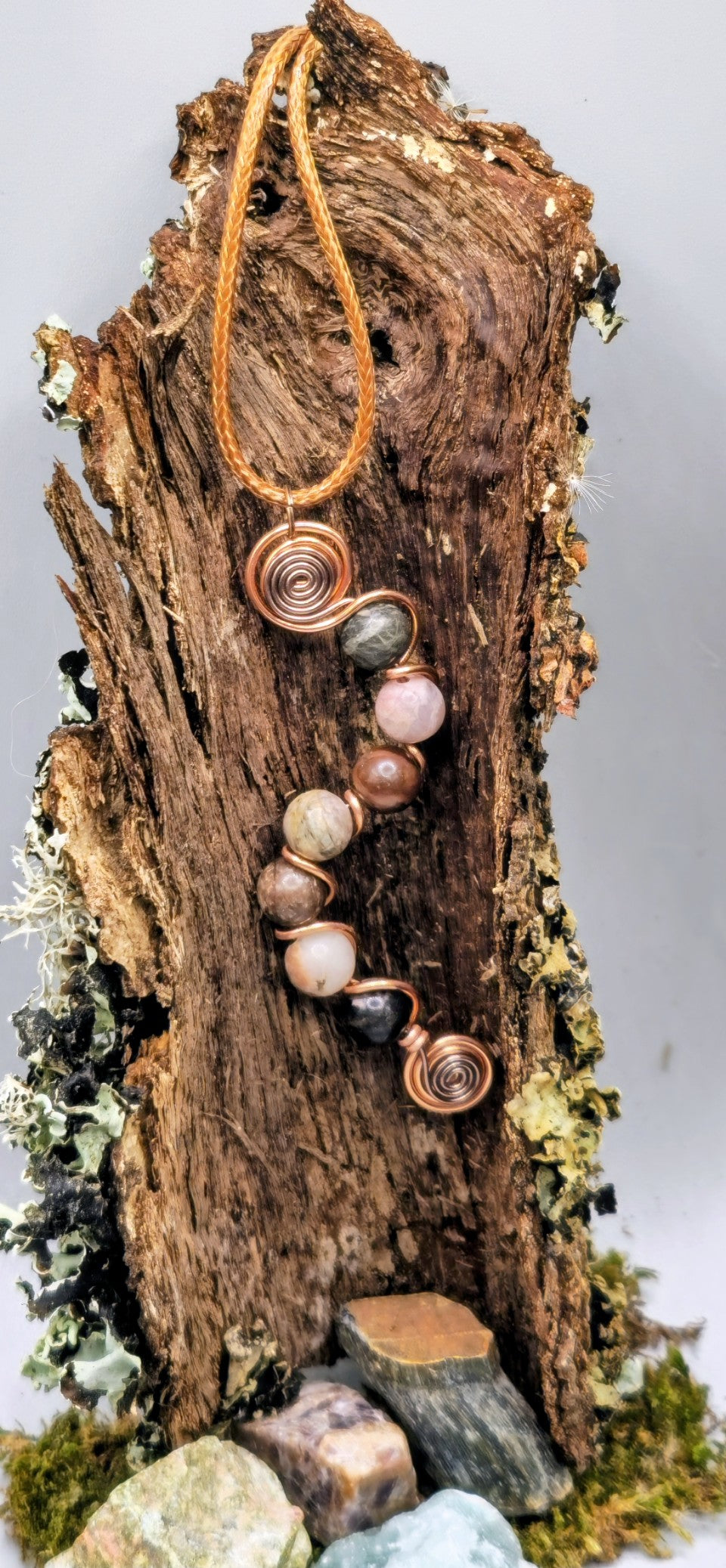 7 bead Rhodonite wavy pendant