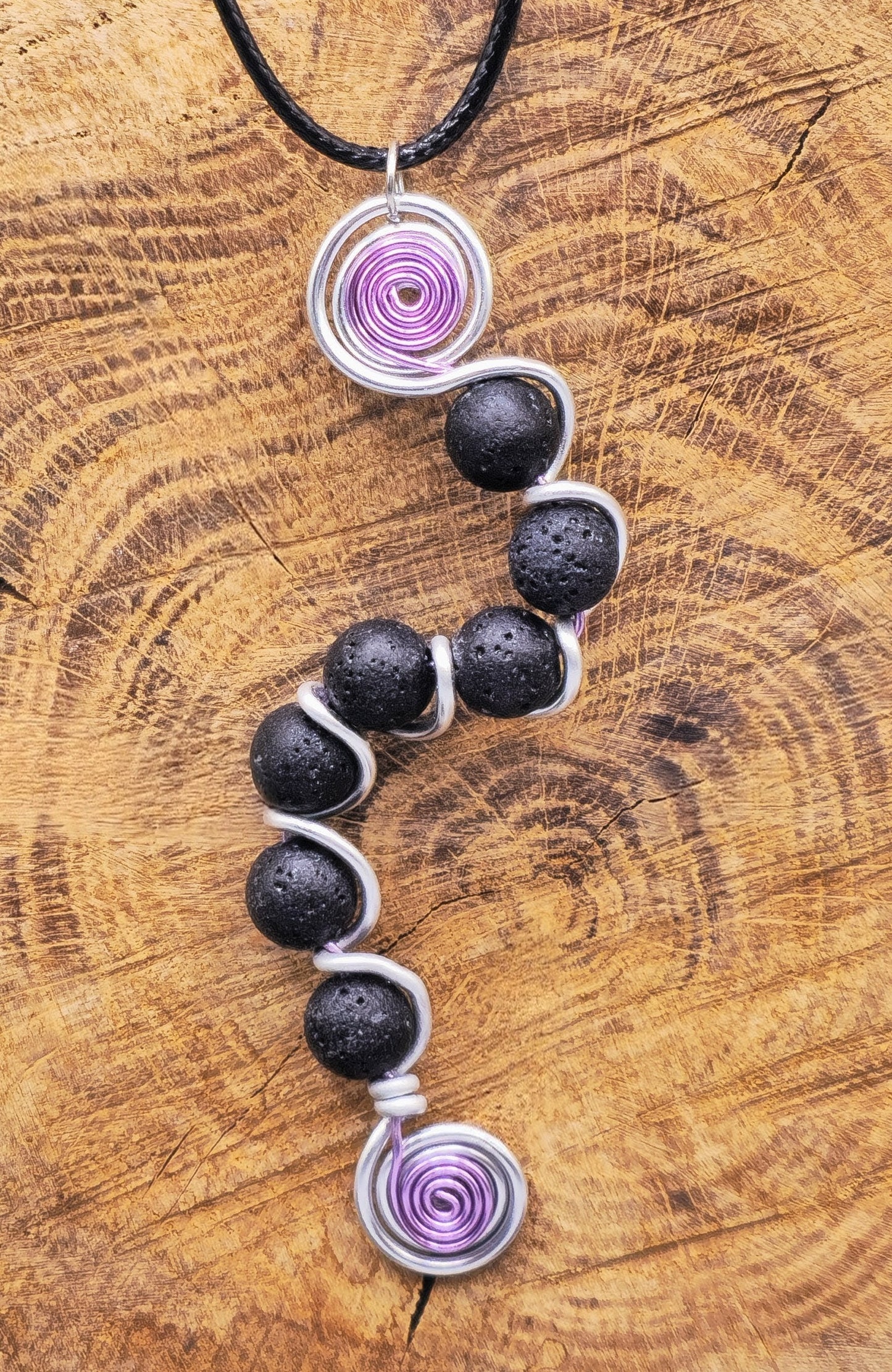7 bead Lava stone wavy pendant