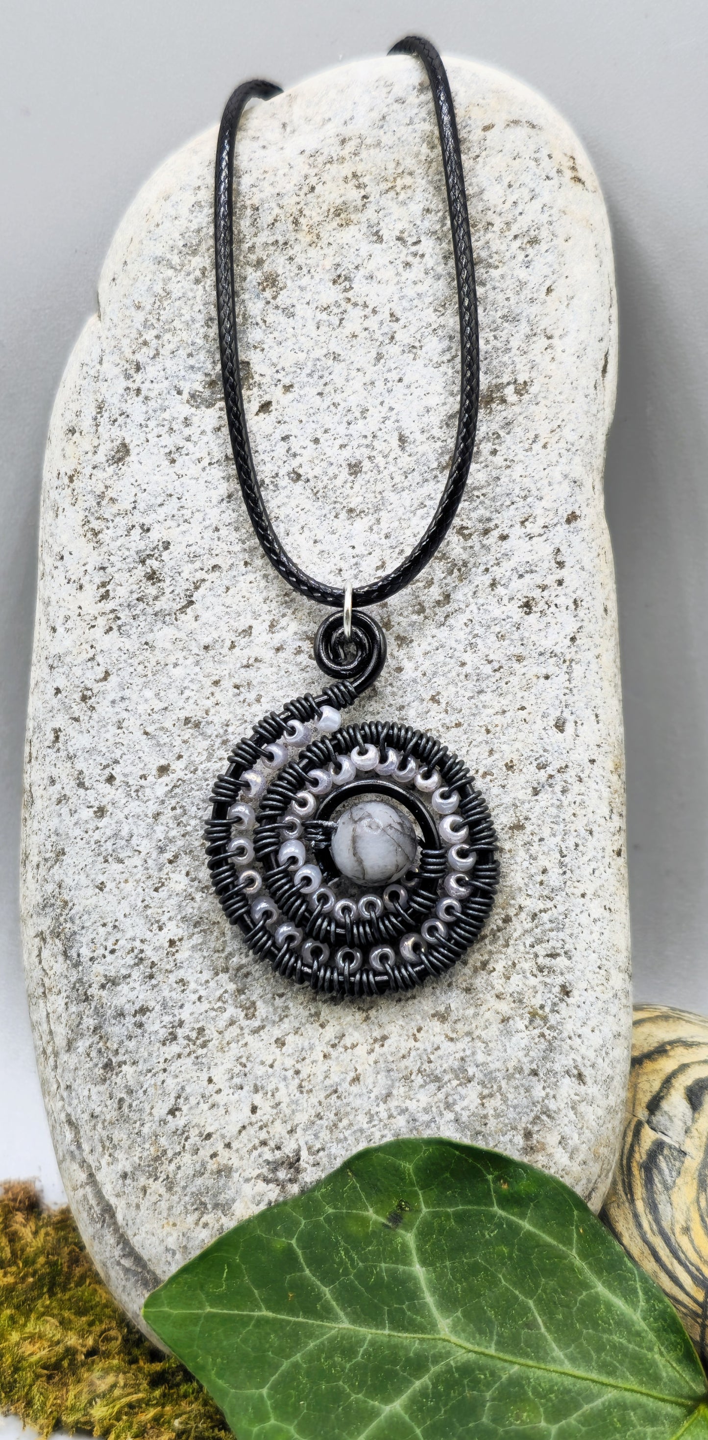 Rhodonite and grey bead spiral pendant