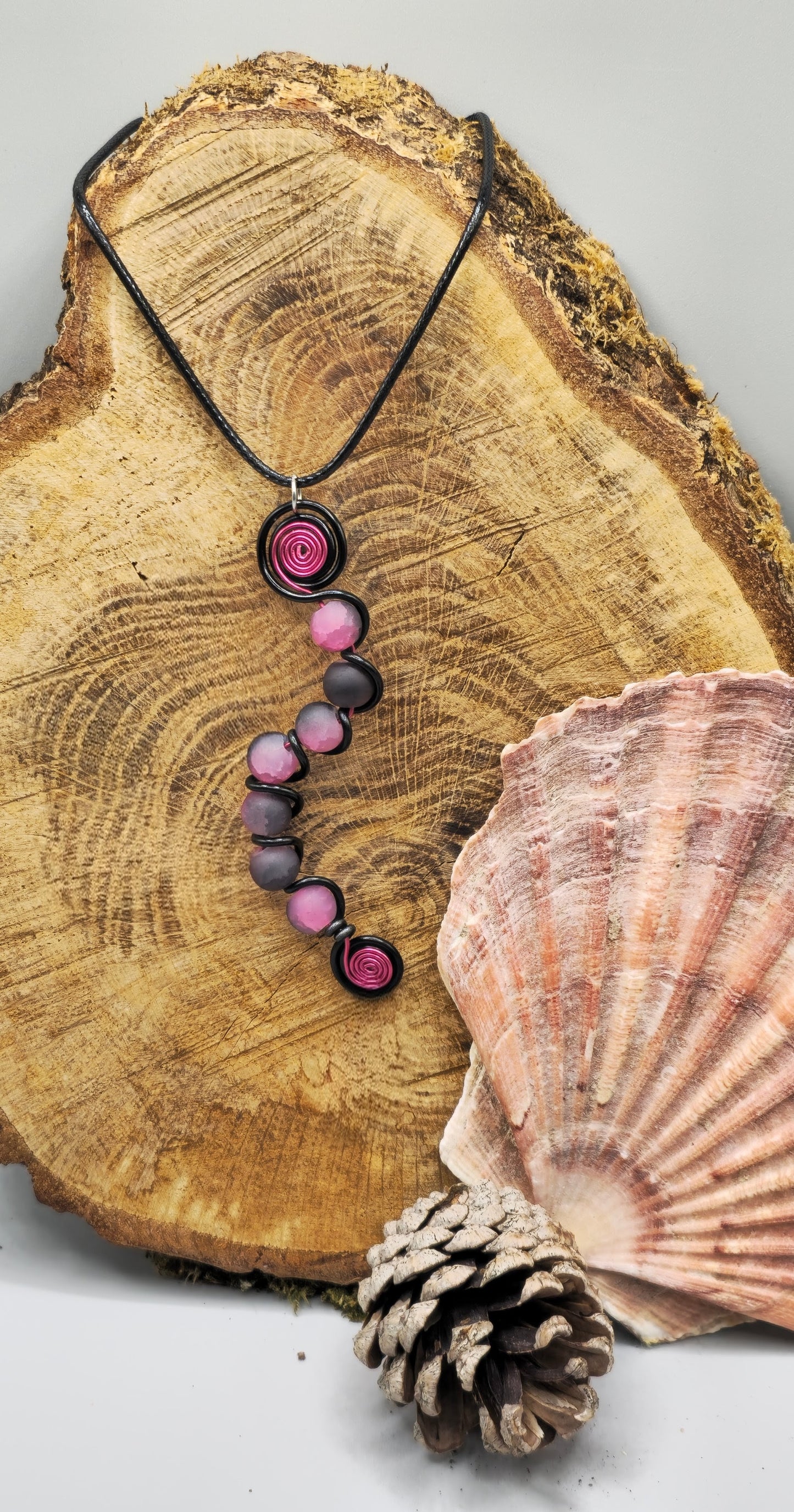 7 bead pink and black pendant
